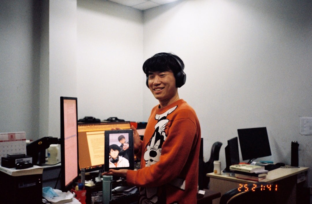 Team coordinating newsroom workflow in a modern media office