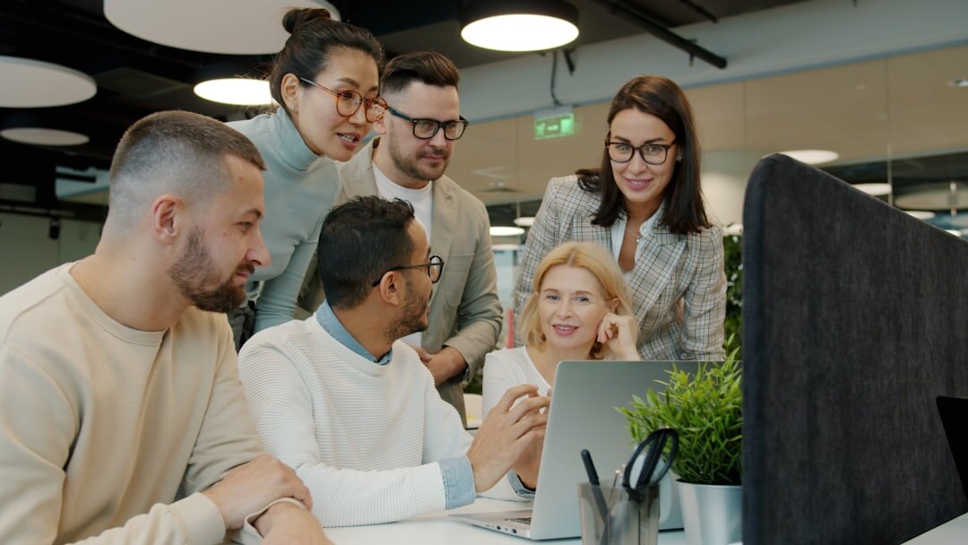 Newsroom coordination hub with team working together at desks